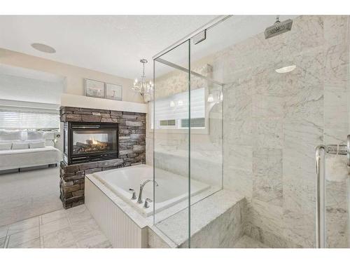5 Mahogany Manor Se, Calgary, AB - Indoor Photo Showing Bathroom With Fireplace