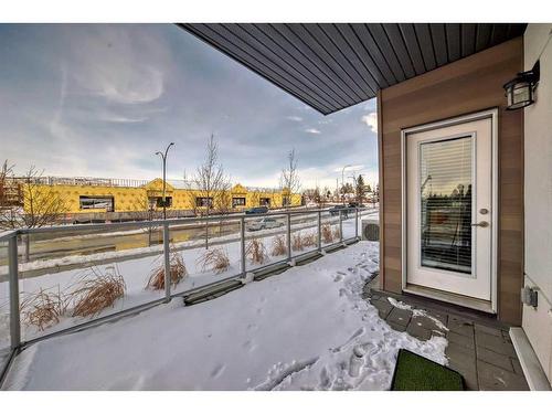 103-150 Shawnee Square Sw, Calgary, AB - Outdoor With Deck Patio Veranda With Exterior