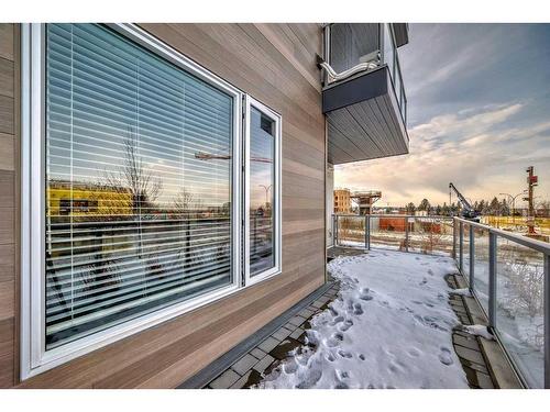 103-150 Shawnee Square Sw, Calgary, AB - Outdoor With Exterior
