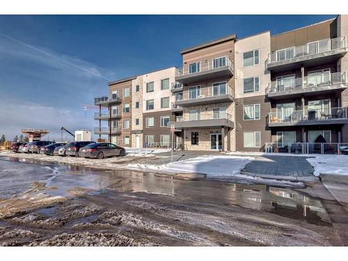 103-150 Shawnee Square Sw, Calgary, AB - Outdoor With Facade