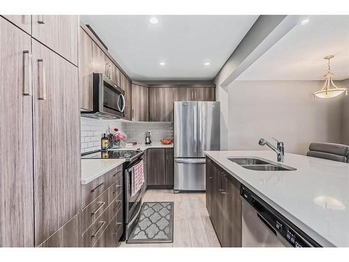 .-209 Cityscape Boulevard, Calgary, AB - Indoor Photo Showing Kitchen With Double Sink With Upgraded Kitchen