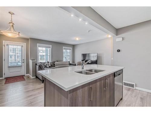 .-209 Cityscape Boulevard, Calgary, AB - Indoor Photo Showing Kitchen With Double Sink