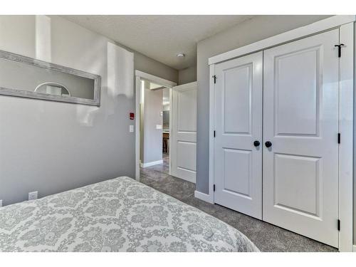 12-606 Lakeside Boulevard, Strathmore, AB - Indoor Photo Showing Bedroom