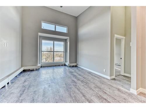 12-606 Lakeside Boulevard, Strathmore, AB - Indoor Photo Showing Other Room