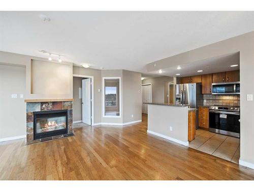 1102-1088 6 Avenue Sw, Calgary, AB - Indoor With Fireplace
