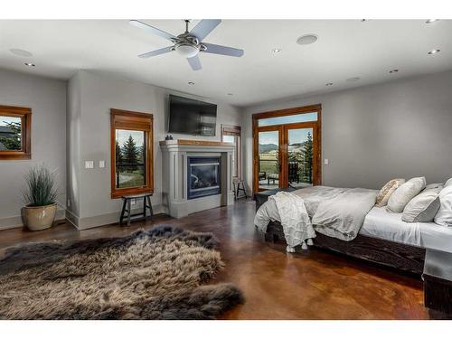 264390 Forestry Trunk Road, Rural Rocky View County, AB - Indoor With Fireplace