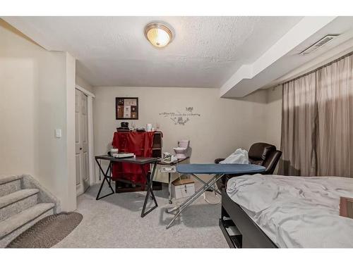 171 Saddlecrest Close Ne, Calgary, AB - Indoor Photo Showing Bedroom