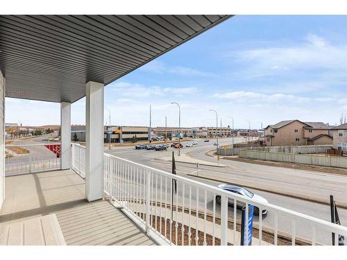 202-255 Les Jardins Park Se, Calgary, AB - Outdoor With Balcony With Exterior