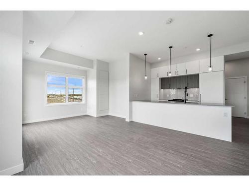 427-255 Les Jardins Park Se, Calgary, AB - Indoor Photo Showing Kitchen With Upgraded Kitchen