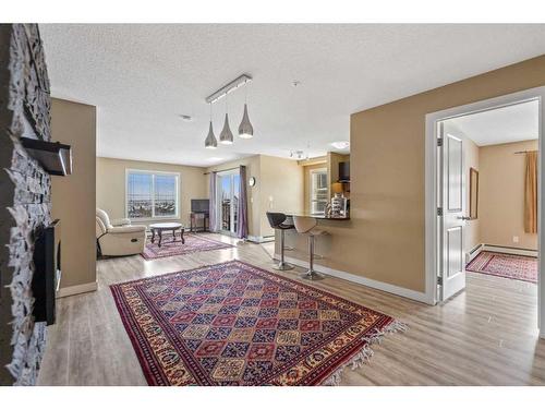 202-195 Kincora Glen Road Nw, Calgary, AB - Indoor With Fireplace