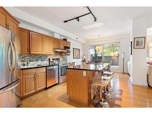 205-4 14 Street Nw, Calgary, AB - Indoor Photo Showing Kitchen With Stainless Steel Kitchen