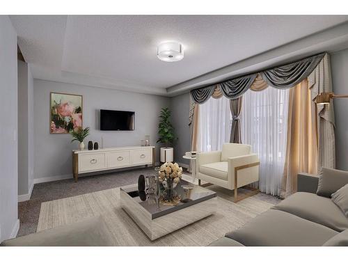173 Baysprings Gardens Sw, Airdrie, AB - Indoor Photo Showing Living Room