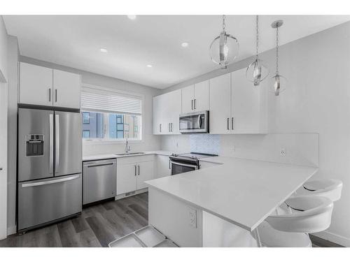 18 Evanscrest Park Nw, Calgary, AB - Indoor Photo Showing Kitchen With Upgraded Kitchen