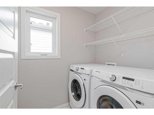 2099 Windbury Crescent Sw, Airdrie, AB - Indoor Photo Showing Laundry Room