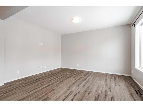 2099 Windbury Crescent Sw, Airdrie, AB - Indoor Photo Showing Other Room
