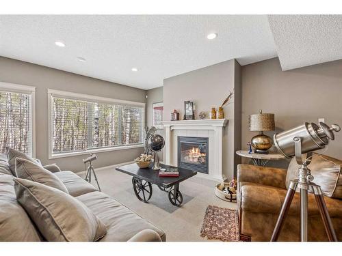 9322 14 Avenue Sw, Calgary, AB - Indoor Photo Showing Living Room With Fireplace