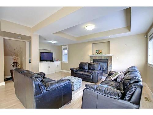 2135 16A Street Sw, Calgary, AB - Indoor Photo Showing Living Room With Fireplace