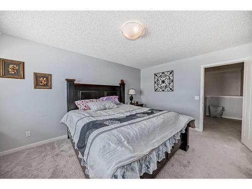 647-101 Sunset Drive, Cochrane, AB - Indoor Photo Showing Bedroom