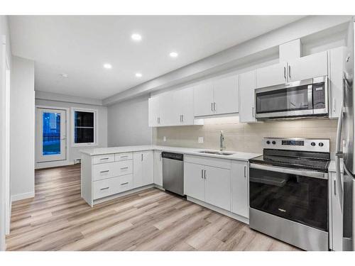 111-55 Wolf Hollow Crescent Se, Calgary, AB - Indoor Photo Showing Kitchen With Upgraded Kitchen