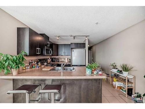 1606-210 15 Avenue Se, Calgary, AB - Indoor Photo Showing Kitchen With Double Sink