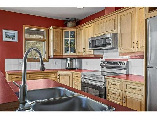 2-817 5Th Street, Canmore, AB - Indoor Photo Showing Kitchen With Double Sink