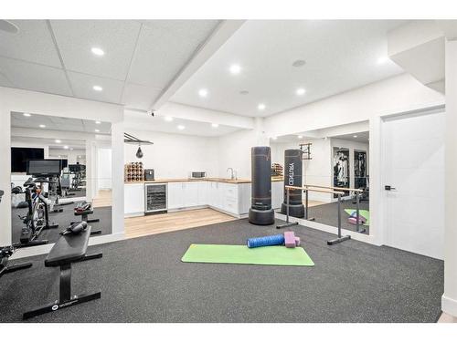 931 Shawnee Drive Sw, Calgary, AB - Indoor Photo Showing Gym Room