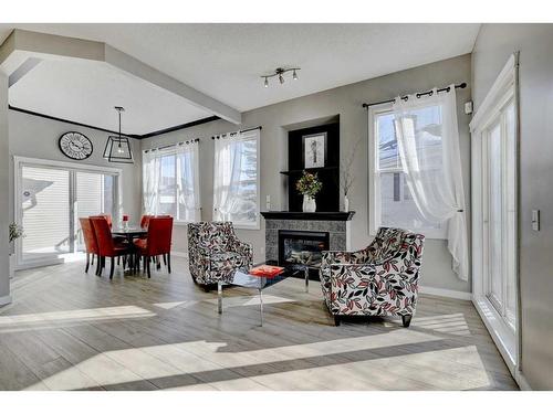 67 Prestwick Gardens Se, Calgary, AB - Indoor With Fireplace