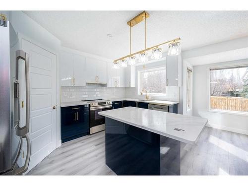 14333 Evergreen Street Sw, Calgary, AB - Indoor Photo Showing Kitchen With Upgraded Kitchen