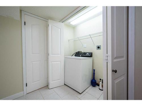 14333 Evergreen Street Sw, Calgary, AB - Indoor Photo Showing Laundry Room