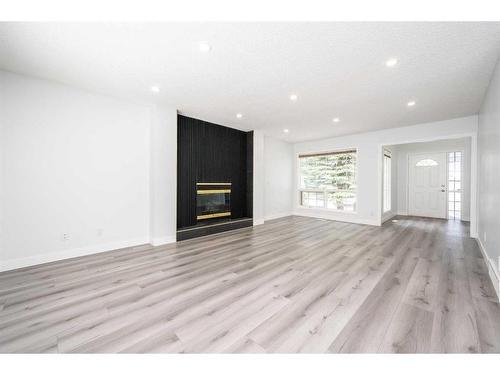 14333 Evergreen Street Sw, Calgary, AB - Indoor With Fireplace