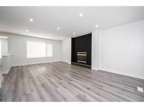 14333 Evergreen Street Sw, Calgary, AB - Indoor With Fireplace