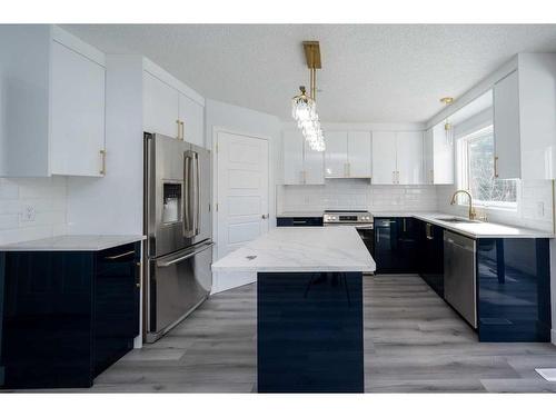 14333 Evergreen Street Sw, Calgary, AB - Indoor Photo Showing Kitchen With Stainless Steel Kitchen With Upgraded Kitchen