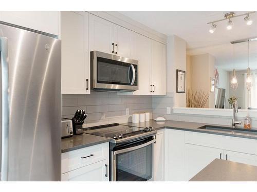 623 Cranbrook Walk Se, Calgary, AB - Indoor Photo Showing Kitchen With Stainless Steel Kitchen With Upgraded Kitchen