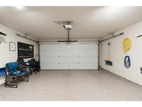 623 Cranbrook Walk Se, Calgary, AB - Indoor Photo Showing Garage