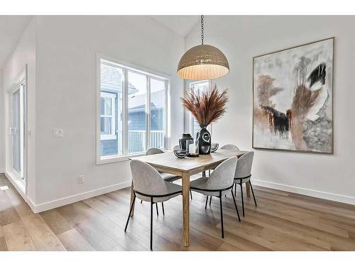 11 Drake Landing Square, Okotoks, AB - Indoor Photo Showing Dining Room