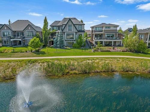 18 Whispering Springs Way, Heritage Pointe, AB - Outdoor With Body Of Water