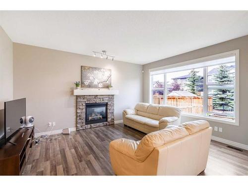 229 Evanspark Gardens Nw, Calgary, AB - Indoor Photo Showing Living Room With Fireplace