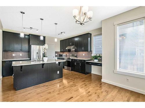 4720 Elgin Avenue Se, Calgary, AB - Indoor Photo Showing Kitchen With Stainless Steel Kitchen With Upgraded Kitchen