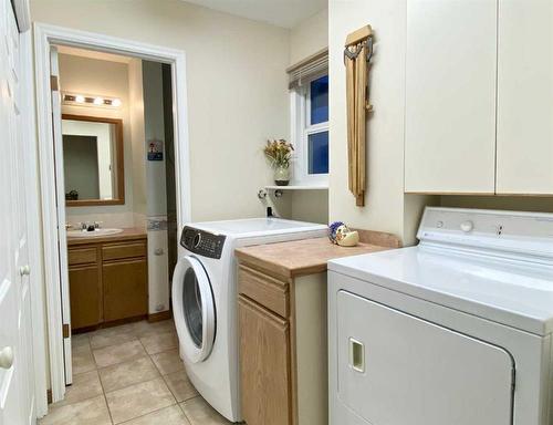 6011 Dalcastle Crescent Nw, Calgary, AB - Indoor Photo Showing Laundry Room