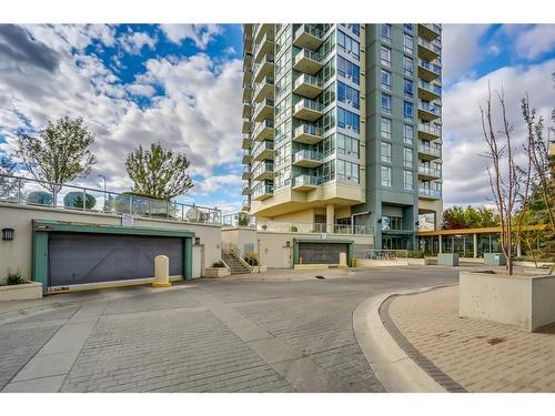 2303-77 Spruce Place Sw, Calgary, AB - Outdoor With Balcony With Facade