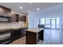 2303-77 Spruce Place Sw, Calgary, AB  - Indoor Photo Showing Kitchen 