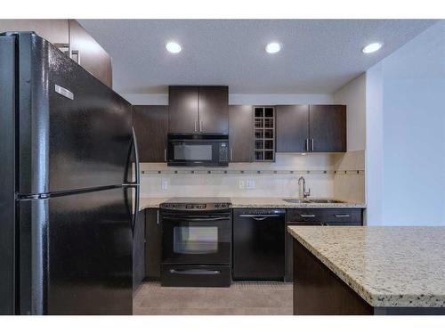 2303-77 Spruce Place Sw, Calgary, AB - Indoor Photo Showing Kitchen