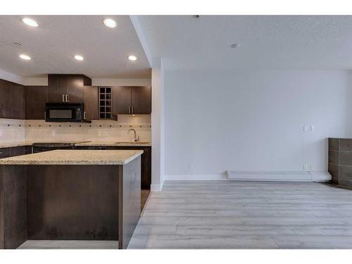 2303-77 Spruce Place Sw, Calgary, AB - Indoor Photo Showing Kitchen