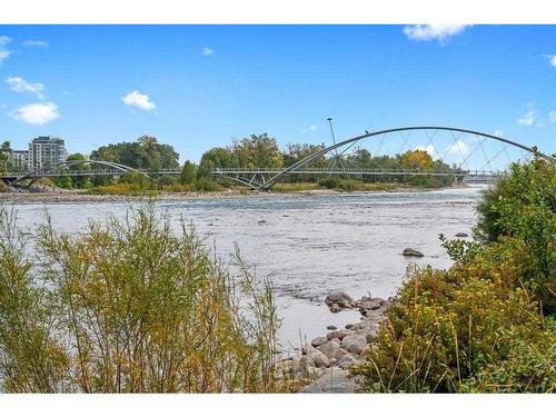 220-619 Confluence Way Se, Calgary, AB - Outdoor With Body Of Water With View