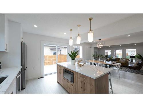16 Cedarwood Place Sw, Calgary, AB - Indoor Photo Showing Kitchen With Upgraded Kitchen