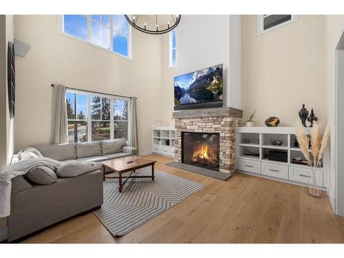 10 Alexandria Green Sw, Calgary, AB - Indoor Photo Showing Living Room With Fireplace