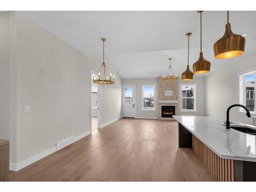 129 South Shore View, Chestermere, AB - Indoor With Fireplace
