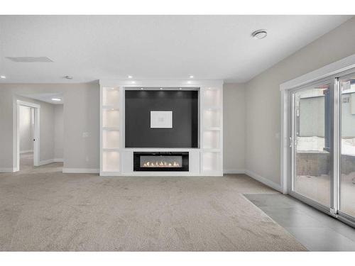 129 South Shore View, Chestermere, AB - Indoor With Fireplace