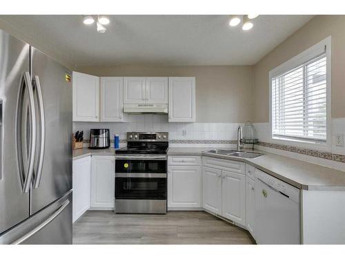 49 Tarington Landing Ne, Calgary, AB - Indoor Photo Showing Kitchen With Stainless Steel Kitchen With Double Sink