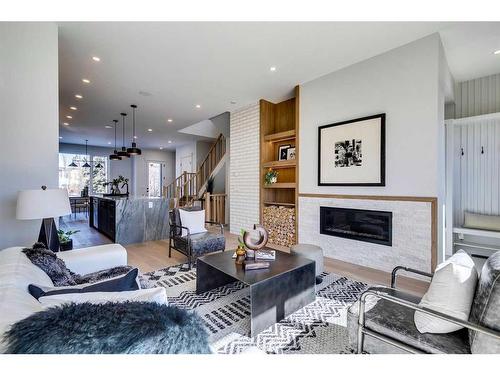 1707 19 Avenue Nw, Calgary, AB - Indoor Photo Showing Living Room With Fireplace